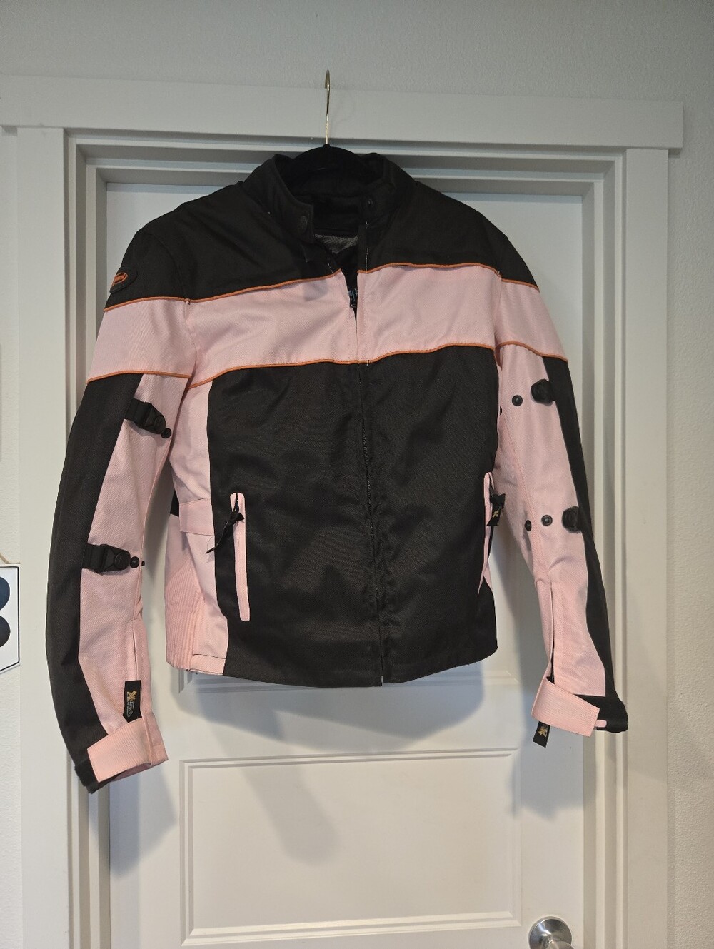 Xelement Women’s Black & Pink Armored Motorcycle Jacket. Size L